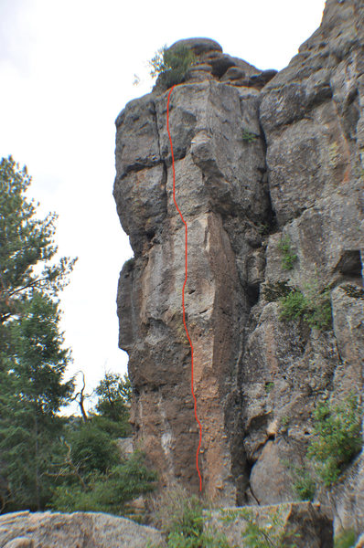 Climb the left-facing corner to a face. Left of the big arch.
