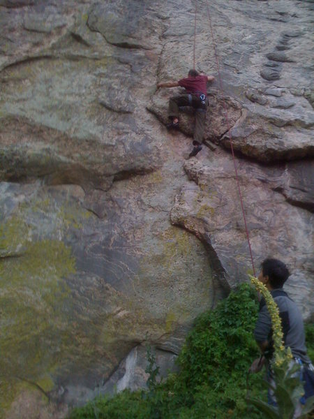 Jay belaying T. Ward on the new slab route two right of Crack a Beer
