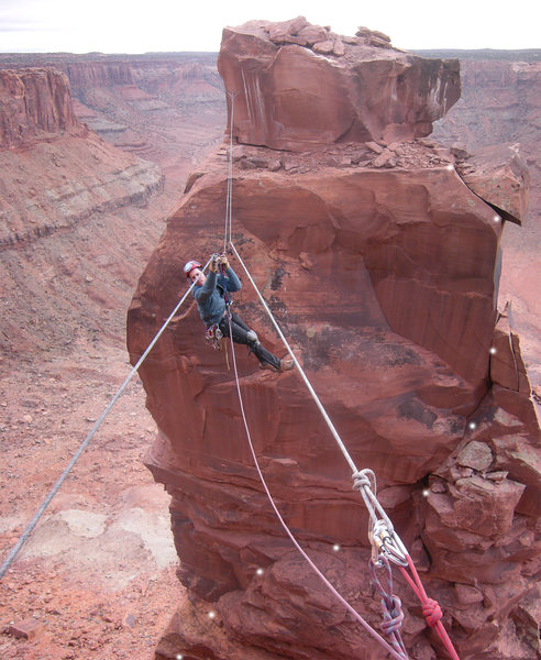 A vertical pano of Sam on his way back to the rim with the upper part of the second pitch marked.<br>
<br>
<b>TREAD VERY LIGHTLY</b> on that block near the top! <br>
<br>
I would have given this route two stars if it had not been for that block.