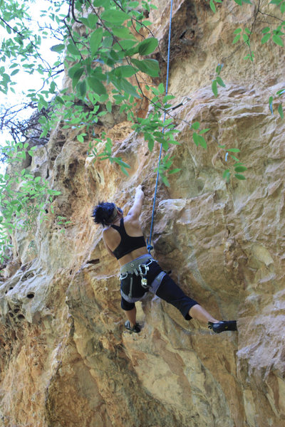Anna tackling the overhang.