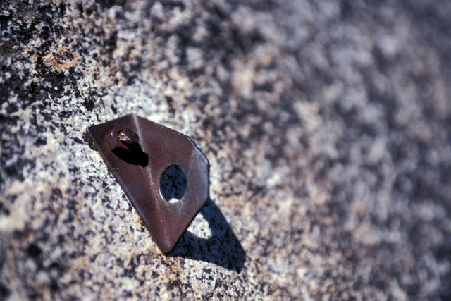 Leaving aside the effects of the fire for a moment, beware of the fixed gear at this site. This picture shows one of the lead bolts on the second pitch of Elephantiasis. Aging gear, such as this, is not uncommon on Elephant Knob.