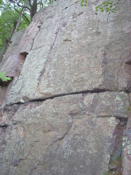 This shows "A Girl Named Sue" a 5.8. From Sven: "Climb face and shallow crack 8 feet left of inside corner (that is left of Judgment Day). Avoid using crack on either side".