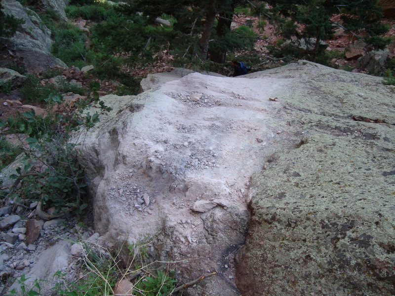 Impact spot showing pulverized rock dust ~50' <em>below</em> the base of Rewritten. A large block must've nailed this slab and disintigrated.