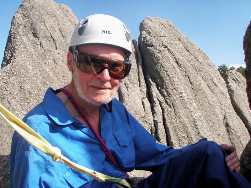 Dave Meyer on/in the big window on top of Rhinoceros Rock. That's Inner Course in the background on the right.<br>
(Photo by Lenore Sobota)