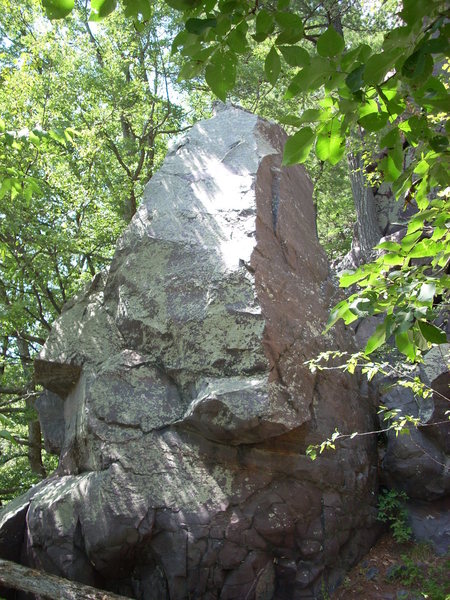This is "Layback Boulder" as seem from TM Overhang. There is a 5.6 layback that starts on the SW side.