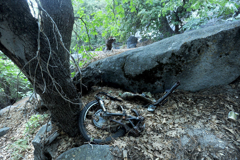 Near the base of Asteroid Belt (5.11) is the remains of a motorcycle that is said to have exited the top of the Dome with its unfortunate rider on board.<br>
<br>
As the story goes, a party was being held on top of the Dome, one night in the early 70s. One motorcycle-riding party-goer proceeded to do donuts, in ever-widening circles, before suddenly straightening out and riding off into the night. <br>