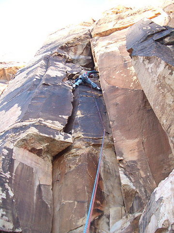 Oooooooooh! That's Andy on Whoosh at the mouth of Oak Creek Canyon in the Red Rocks, Las Vegas. This is a terrible place to belay or hang out at the crag. A giant loose block is teetering ready to fall from the top of this pitch. PLEASE share this WARNING as widely as possible.