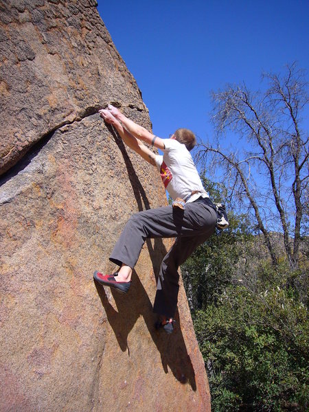 Just past the broken hold on the crack.