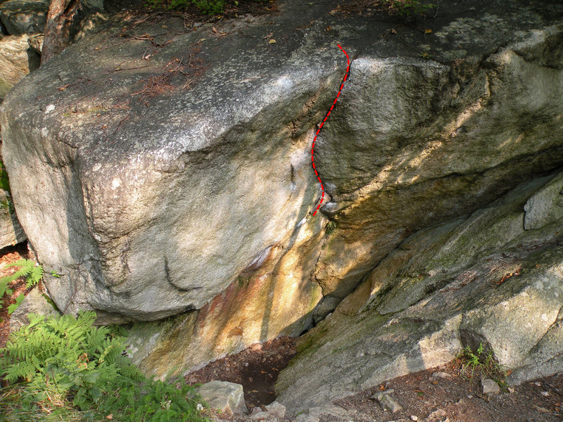Start with your hands on the two chalky holds in the horizontal and climb up the vertical crack and face to the top out