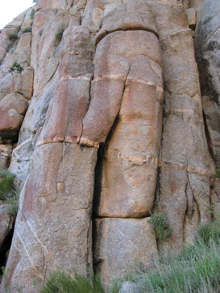 Pleiades starts in the wide crack, moves left to the tips crack. Towards the top the line moves back right into a seam above the horizontal crack. A worthy lead and a worthwhile TR