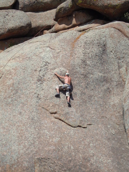 This is a climb we did in the East L.A. climbing area in Vedauwoo, WY. I am not sure what it is rated but the feet and hands were very thin. Sweet climb!