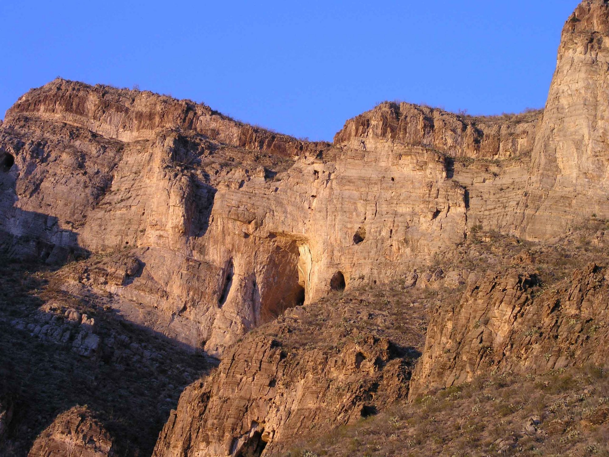 Panorama photo showing the Bat Cave, Walls left of the Bat Cave, and