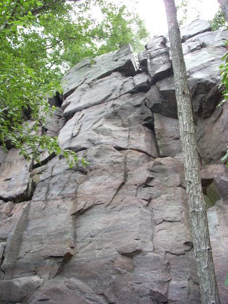 "Moon Beam" climbs the face between the cracks.