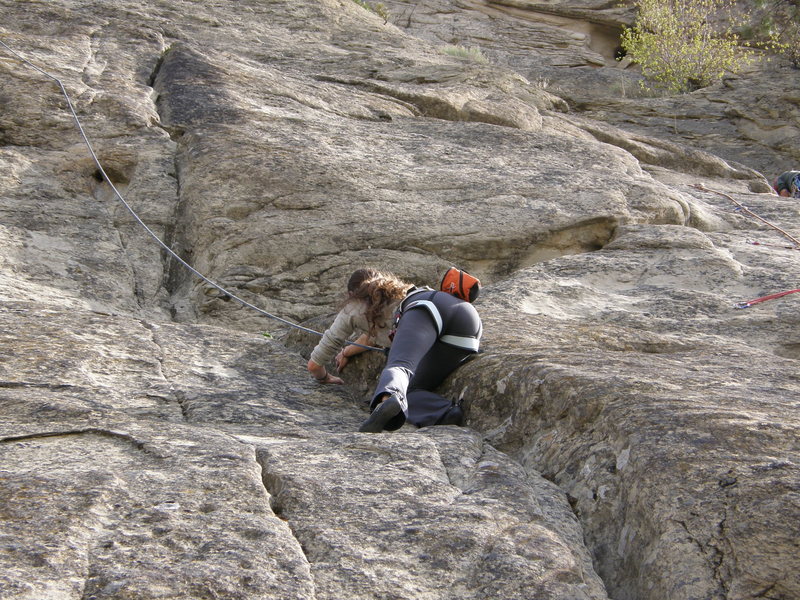 Moving up the crack to the first pitch, then on to Lightening Crack