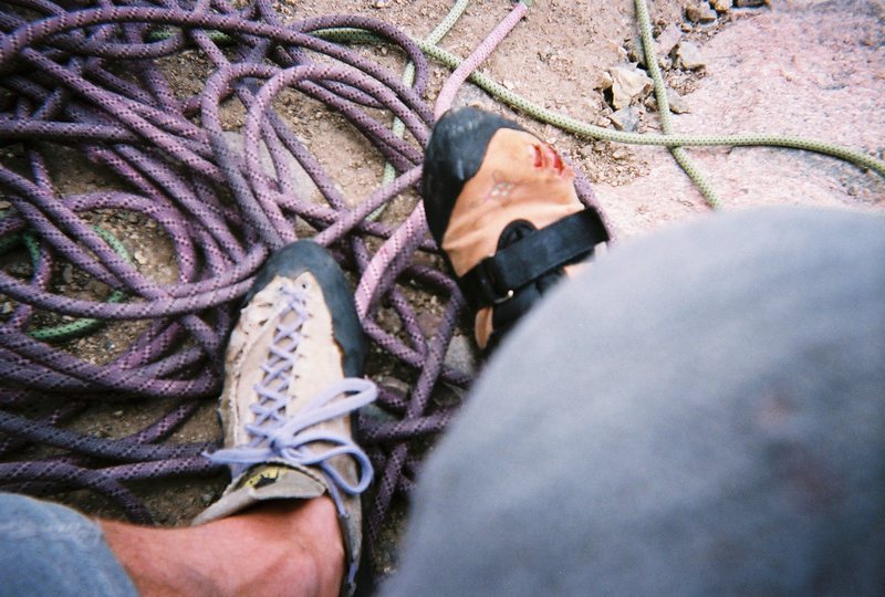 Mismatched shoes and bloody toes--what happens when you do hundreds of feet of handcracks in an Anasazi velcro.