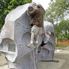 From Milwaukee Journal Sentinel:<br>
<br>
"John Knapp and his son Josh climb the newly installed Jakes Rock climbing boulder at Hales Corners Park on Wednesday. The boulder was donated to the park by the Knapp family to honor Jacob, who died suddenly from a seizure in March 2004. The purchase of the 16-foot-long, 11-foot-tall boulder was made possible from donations given to the family at the time of Jacobs death and fund-raisers. Jacob, a climber, was 18 and a freshman at the University of Wisconsin-Milwaukee at the time of his death. Milwaukee Journal Sentinel photo: Jack Orton"