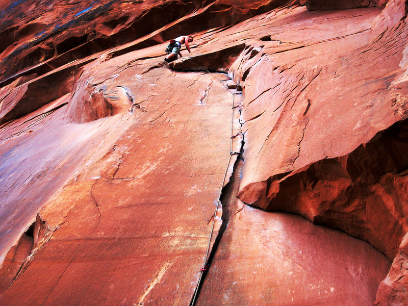 Atop a new fav crack in Moab. Zipped up.