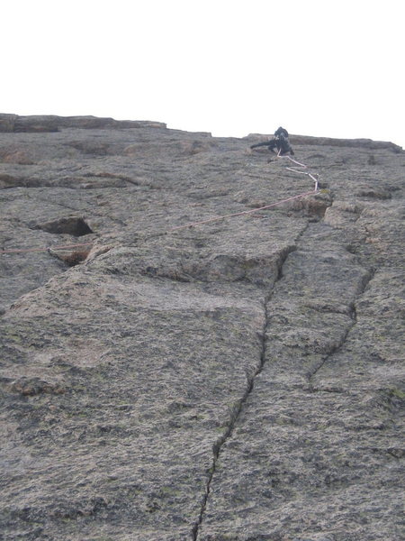 Jesse working his way up the really nice finger crack on Malander's.