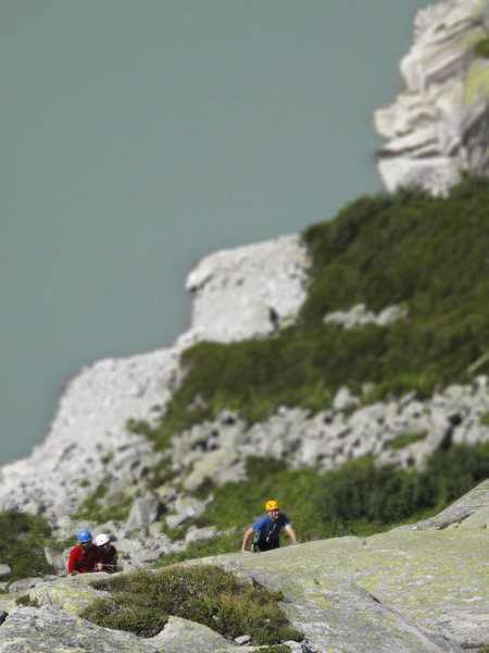 Bernhard Streicher climbing Wassersinfonie (5b**), on the Albigna Hut slabs.