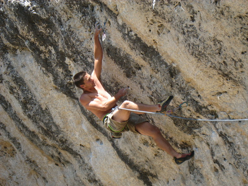 The sidepull mono move on Cow Reggae. <br>
<br>
BJ is actually working the heinous linkup "Genetic Drifter" which climbs all but one move of Cow Reggae after blitzing the cruxes of the 13c & 14a to the right!