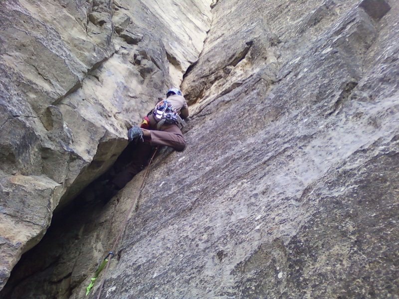 Jared doing the crux of the Cave Route.