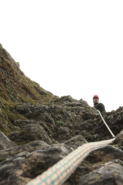 Derrick belaying the second pitch route that moves right of first.