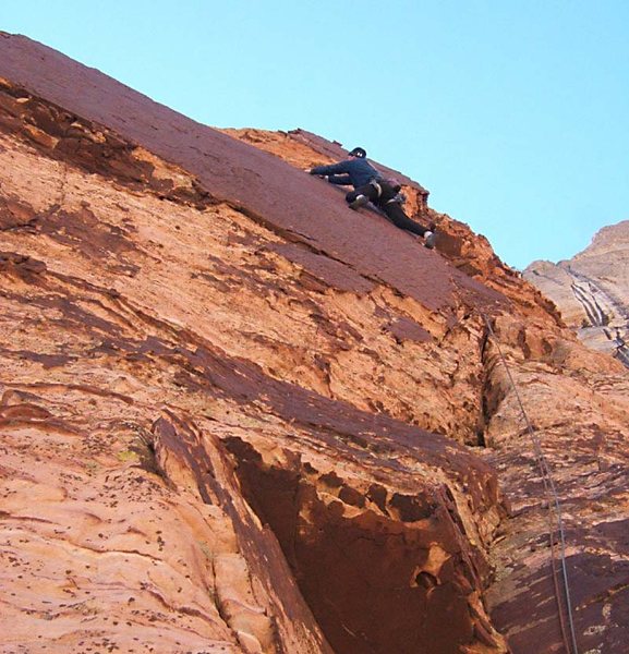 An airy move to the left on the traverse.