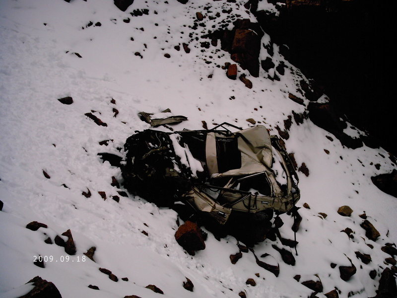 A car in the left Col driven off the summit by a suicidal teenager. He lived, believe it or not.