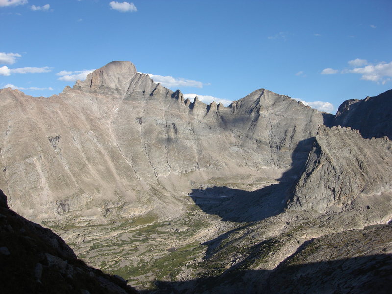 This is upper Glacier Gorge as seen from Arrowhead rather late in the day and late in the summer. The view is facing southeast and includes Longs Peak, Keyboard of the Winds, Pagoda Mountain and Spearhead. The East Ridge of Chiefs Head Peak climbs out of the frame to the right.
