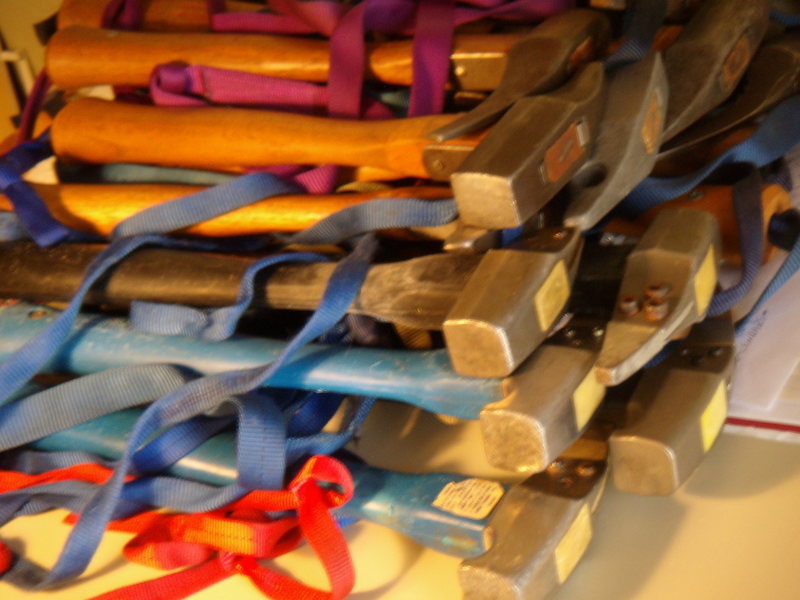 pile of Chouinard hammers,<br>
climbing gear