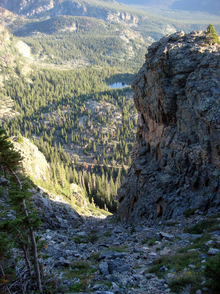 A Walk In The Park begins with the Regular Route on Thatchtop Mountain. This view looks down the key second gully (of the Regular Route) to the Loch Vale Trail, whereas one leaves easy hiking behind for a very long ways.