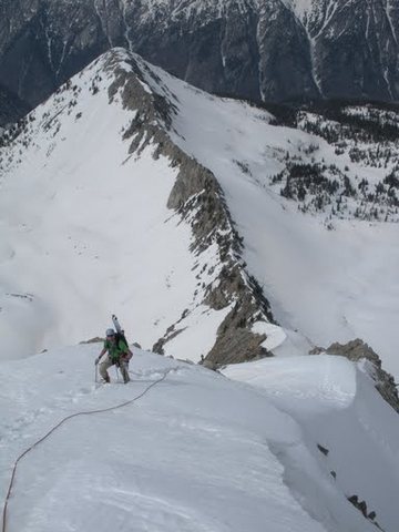 Classic snow climbing on the upper ridge with Hogum Divide beyond.