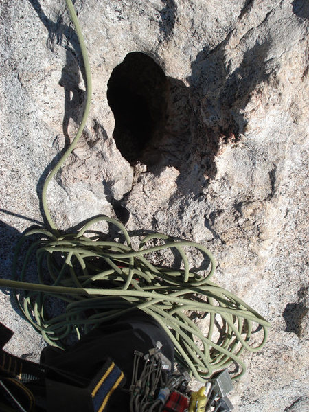NOT COOL!!!! a hueco at a belay stance that is filled with PISS!!! This is gross and un acceptable... piss on the face off to the side of the route where it can evaporate and rinse in the rain... or in a bottle or whatever, the piss in the hole here has been cooking in the sun for weeks!!!