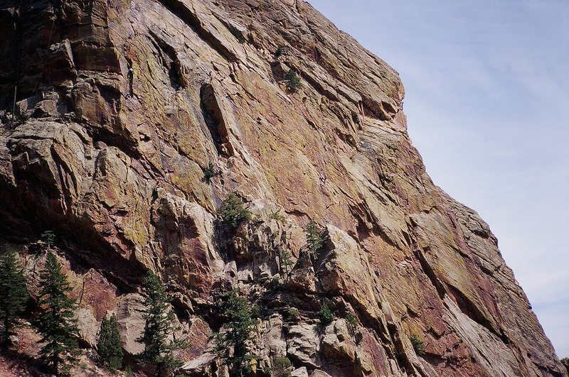 The South Face of Redgarden Wall as seen from the park road. The prominent dihedral left of center is the Rover dihedral. Photo by Tony B., 2007.