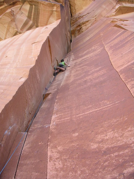 Bad Rad Duality. Ryan Sprackling, left toe on the tiny rest flake between sections of 5.10+.  <br>
<br>
Photo by Emily Kuhr.