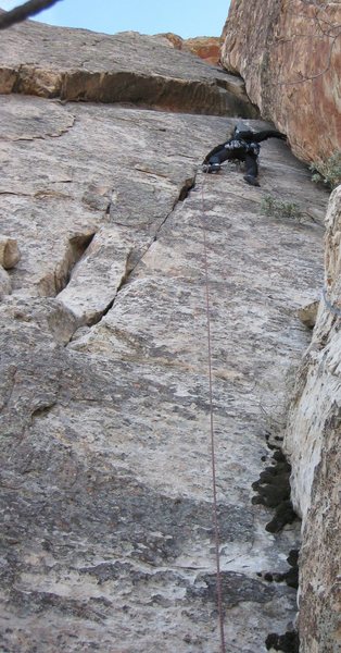 Jonny just about to enter back into the chimney. Pitch 6 from Doug Hemken's beta. We both felt this chimney pitch was the crux pitch of the route. <br>