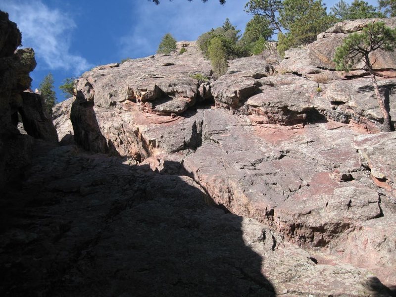 Climb left to Mallory Cave, right & up P1 of FF.