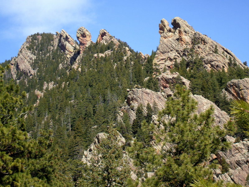 From right to left, Tower of the Moon, Jam Crack Spire, The Pyramid, Devils Thumb, Devil's Horn's, and Sunset Wall as seen from the approach to Shadow Canyon.