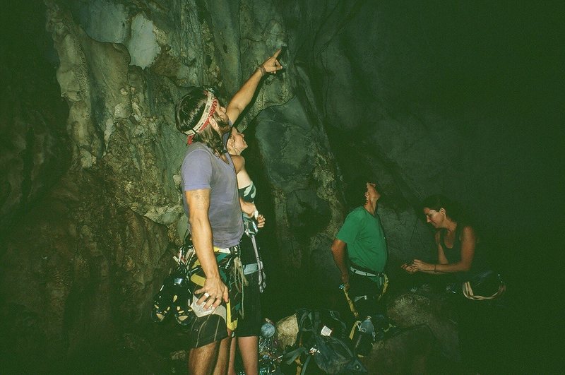 A group of Climbers inside the Secret Cave scope the route inside. Photo by Tony B, 10/09.