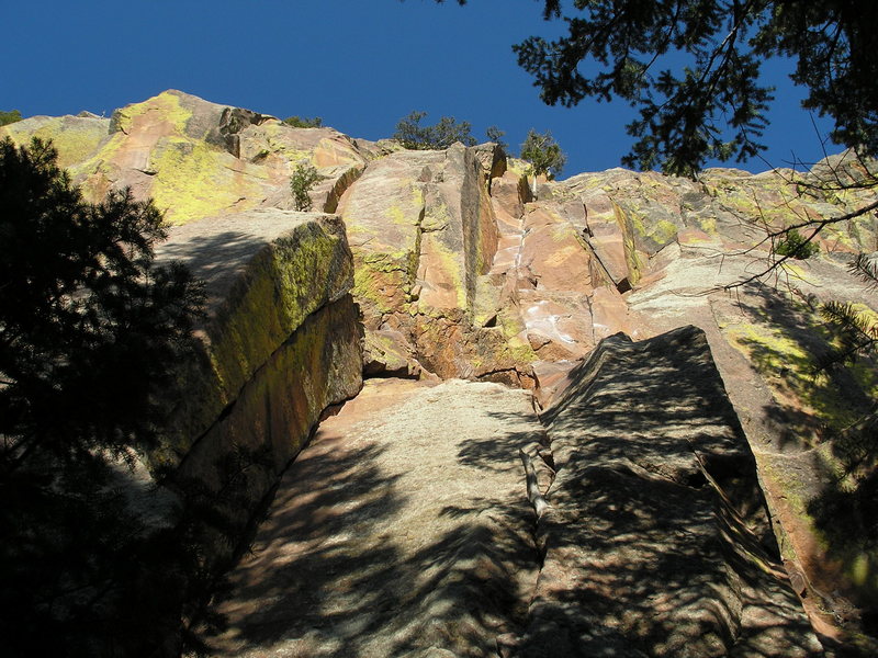 Friends in High Places goes up the chalked up dihedral in the sun.... you can choose the direct start or do the first pitch of Purple Haze into this pitch, which keeps it a bit more consistent.