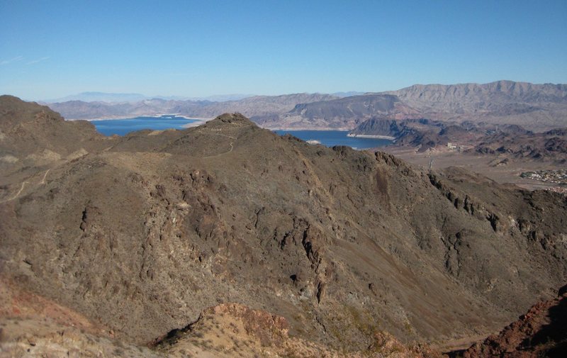 Great panoramic views of Las Vegas, and desert views of Lake Mead, Hoover Dam, and Boulder City can be seen from the high up on the hilltops in Bootleg Canyon. <br>
<br>
I'm not into extreme mountain biking, but there's some pretty fun-looking steeps, jumps, turns, and scary ass trails in Bootleg Canyon!<br>
<br>
In Beautiful Boulder City; a mellow (from LA standards) 30 minute drive from Vegas.<br>
<br>
Taken 11/24/09
