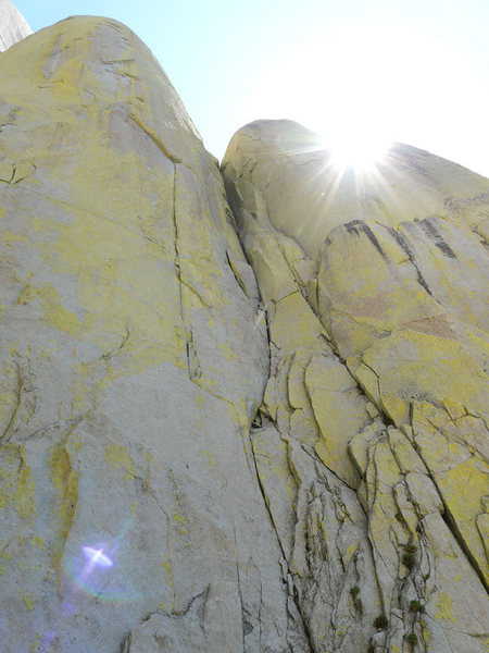Looking up at The Sarcophagus. The blocky, loose face on the left is the regular start. We took the steep crack on the right.