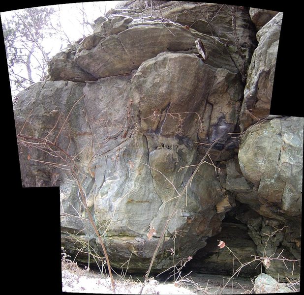 The left side of the cave and up is this problem.  About 22 foot tall to the topout ledge.  See photo below.