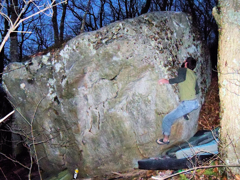 Steve pressing up to the ledge on "Shasta" (v-3), Light Boulder, Bluefield.