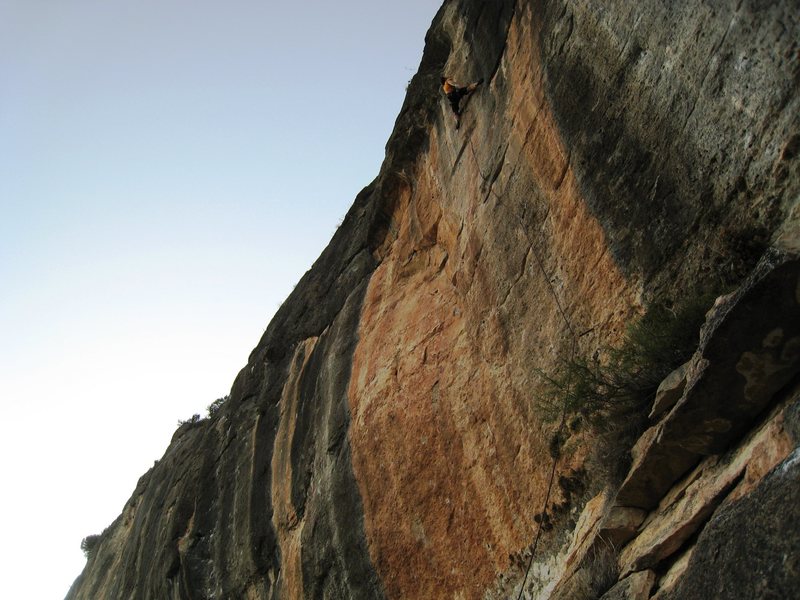 Onsighting "Siouxie", just above the crux at the double pocket rest.