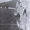 My first ever day on a rock climb 1952. We followed marks on the rock not knowing what climb we were on or grade.The reason we came here was to  look for Jackdoor nest's . The same day we soloed the climbs on Brown Slabs.The photo was taken with a Brownie Box Camera.Footware leather sandals.