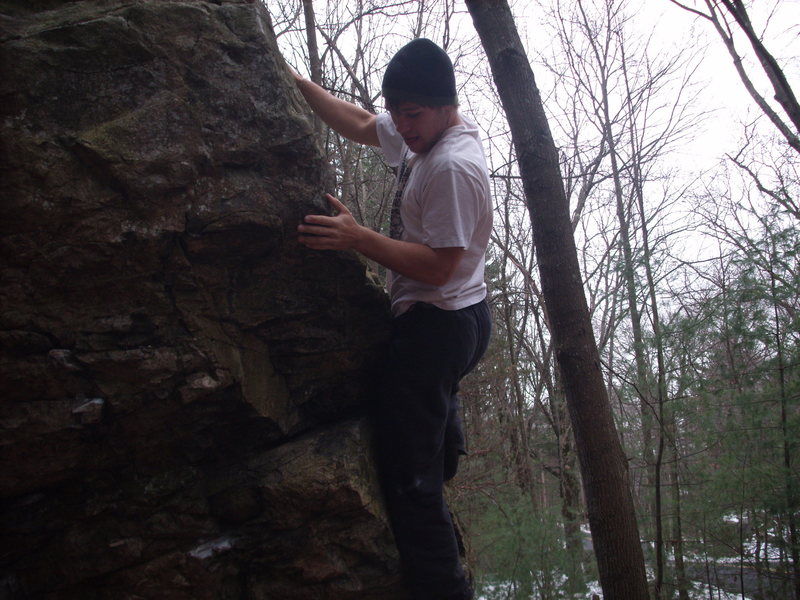 Climbing in Stickney's Boulder, Eastern, MA