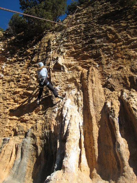 Tough moves above the column lead to a juggy flake.