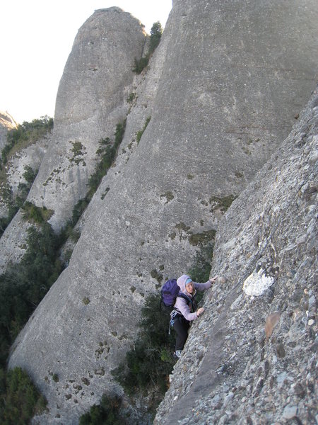 Finishing up the crux third pitch, with Gorra Marinera in the background.