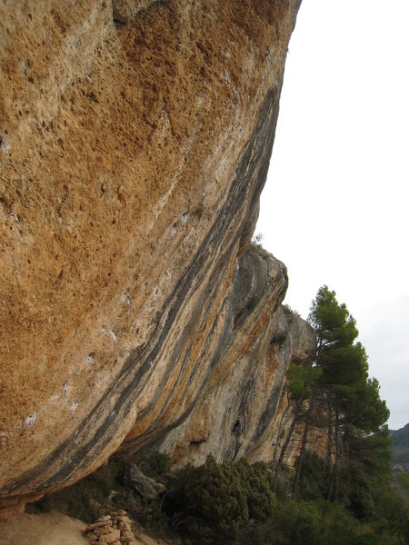 Part of the right end of Espadelles.  The climber (in black) is on "Toni Kaneloni", 8a+.